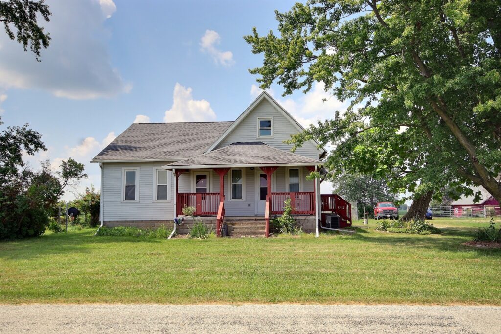3 Bedroom Country Home features 26×36 Horse Barn with 5 Stalls and additional 46×58 Barn on 1.46 Acres