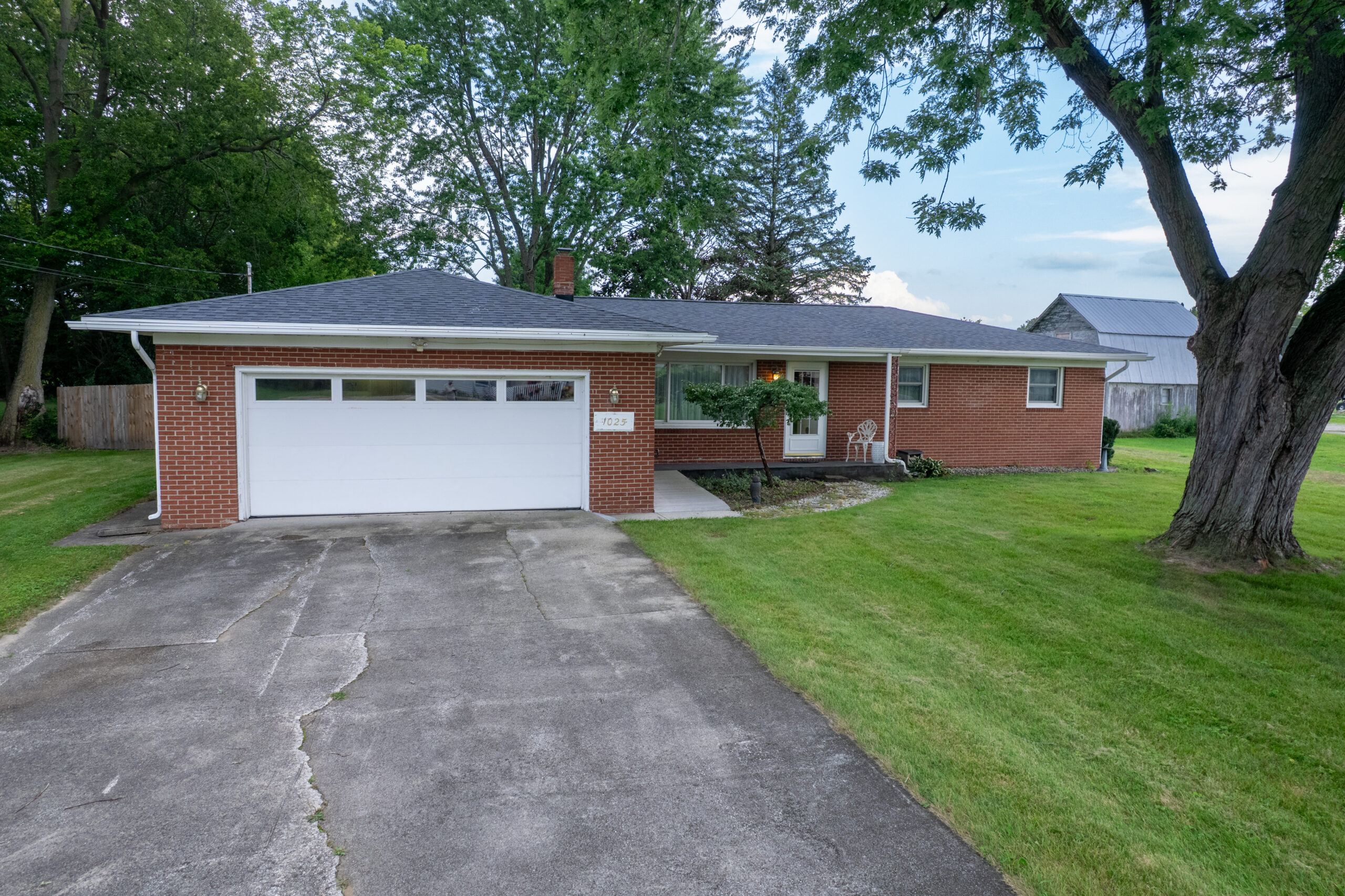 3 Bed All Brick Ranch on 0.83 Acres with 30 x 48 Pole Building and 2 Car Garage
